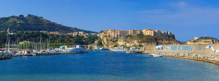 Tropea, Italy - September 9, 2019: Panorama of yacht port of Tropea town. View on port and green mountains 
landscape. Porto di Tropeaのeditorial素材
