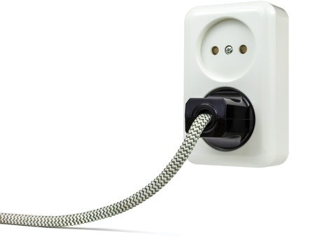 European wall power outlet with power plug isolated on a white background European wall power outlet with power plug isolated on a white background