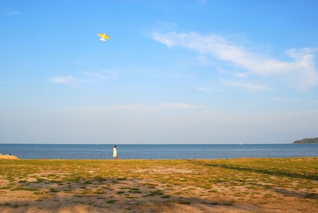 A man play kit on a beachの写真素材