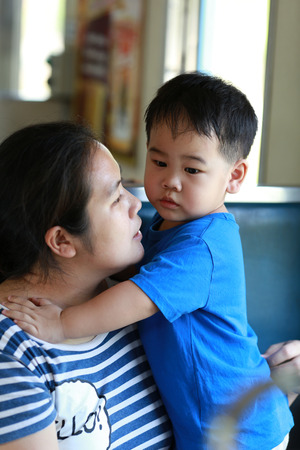 Mother and son travel with trainの写真素材