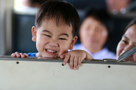 Young boy travels with trainの写真素材