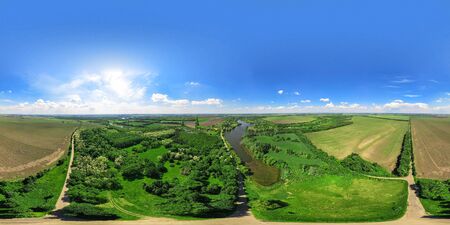 Aerial View: 360 degree shooting of Beautiful River and Green Meadows. Turn right. Magestic landscape.の写真素材