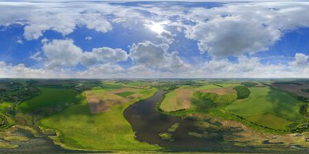 Amazing Aerial panorama countryside, fields, trees, river with pattern at cloudy day .. The...