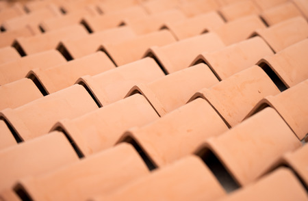 Close up of brown roof tiles under the sunlight.の写真素材