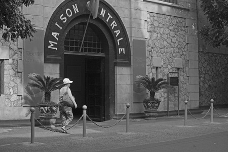 HANOI, VIETNAM - OCT 11, 2014: Front view of Maison Centrale (Hoa Lo in Vietnamese) - a prison used by the French colonists, and later by North Vietnam for prisoners of war during the Vietnam war.のeditorial素材