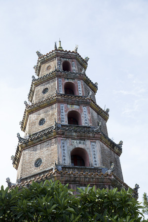 Close up portrait of Thien Mu buddha tower - a very well known sightseeing in Hue ancient capital, Vietnam.の写真素材