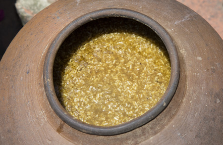 Jars of processing soybean jam made by traditional outdoor way under natural sunlightの写真素材