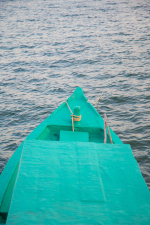 Blue wooden fishing boat in Phu Quoc island sea, Kien Giang province, Vietnamの写真素材