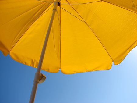 Sun umbrella in a clear dayの写真素材