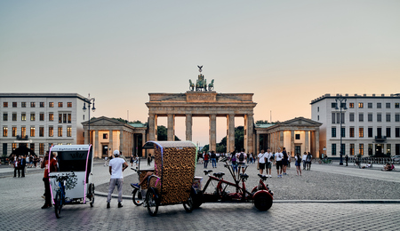 Berlin Pariser Platz Brandenburg Gate Rickshaws waiting for customerのeditorial素材