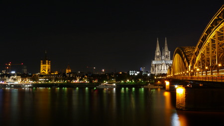 Cologne bridge at nightの写真素材