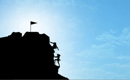 Couple climbing mountain helping each other. man and woman silhouette on half way of the top of mountain. Businessman and businesswoman collaboration concept. Achievement and goals. business conceptの写真素材