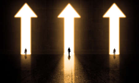 Fantasy Arrow Door, Surreal business doors. Great concrete room with 3 businessmen in bright arrows gate. Walking in grungy floor and wall, Looking forward new opportunity. Business leaders concept.の写真素材