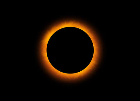 Solar Eclipse phenomenon. Total Eclipse Orange sunshine Around The Full Black Moon. Solar eclipse...
