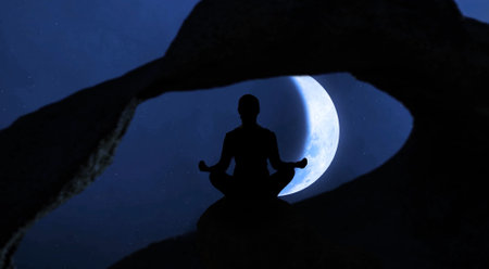 Silhouette of a buddha sitting in the lotus position on the moonlight