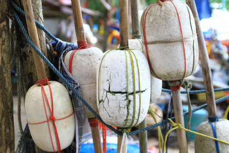 Fish trap buoys with bamboo wood and ropesの写真素材