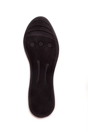 Isolated orthopedic insole on a white background. Treatment and prevention of flat feet and foot diseases. Foot care, comfort for the feet. Wear comfortable shoes. Medical insoles. Flat Feet Correction.の写真素材