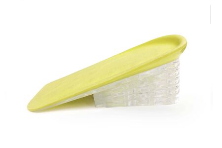 Orthopedic silicone heel pad from corns for the correction of different lengths of legs isolated on white background. Silicone insert for the forefoot. Medical insoles. Flat Feet Correction.の写真素材