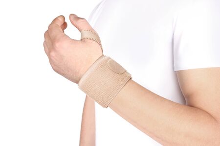 Elastic Wrist Bandage. Orthopedic medical Fitness Hand Bandage. Elastic Wrist Injury Support. Sport Protective Wristband. Wrist Positioning Orthosis. Wrist pain.の写真素材