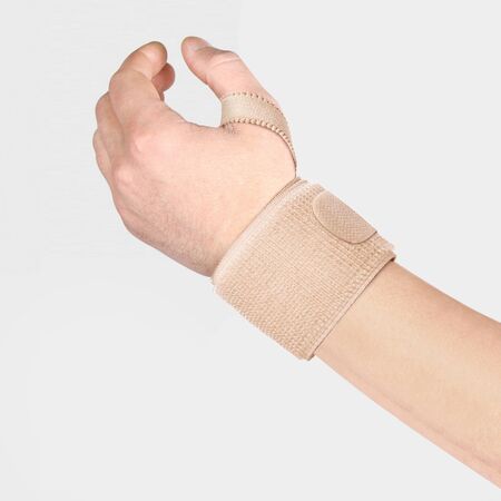 Elastic Wrist Bandage. Orthopedic medical Fitness Hand Bandage. Elastic Wrist Injury Support. Sport Protective Wristband. Wrist Positioning Orthosis. Wrist pain.の写真素材