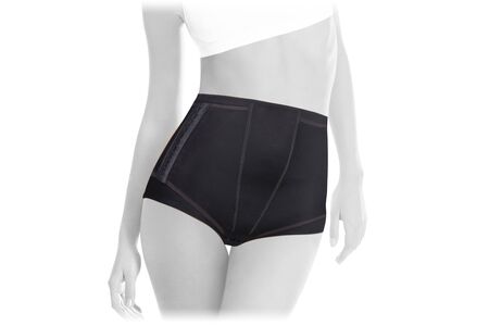 Postnatal Bandage. Medical Compression underwear. Orthopedic bandage underpants for lowering of the pelvic organs. Postpartum Tummy Control Belly Bandage. Female Bodyshaper. Postoperative bandageの写真素材