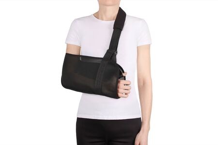 Shoulder Joint Brace. Bandage on the shoulder joint (scarf) with additional fixation. Deso's Handwrap. Supports & Immobilizers. Orthopedic medical braces. Shoulder injury.の写真素材