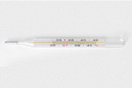 Classic Medical glass mercury thermometer for measuring body temperature isolated on a white background. ?lose-up photoの写真素材