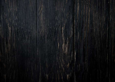 Black wood color texture horizontal for background. Surface light clean of table top view. Natural patterns for design art work and interior or exterior. Grunge old white wood board wall pattern.の写真素材