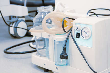 Empty operating room in a hospital. Surgical equipment with operating table. Medical device for...