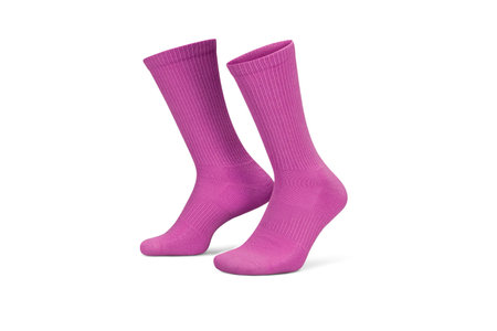 Pair of pink cotton socks isolated on white. Set of short socks for sports as mock up and label for advertisingの写真素材