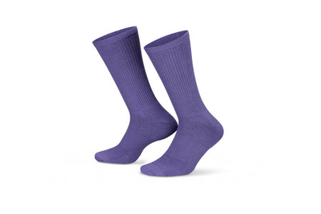 Pair of purple cotton socks isolated on white. Set of short socks for sports as mock up and label for advertising, logo, branding.の写真素材