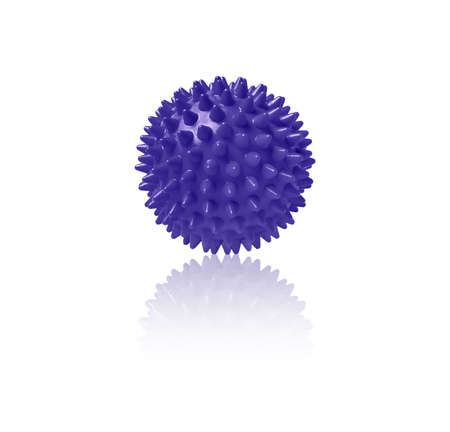 Blue plastic spiny massage ball isolated on white. Concept of physiotherapy or fitness. Closeup of a colorful rubber ball for dog teeth on a white color background. Corona virus model.の写真素材