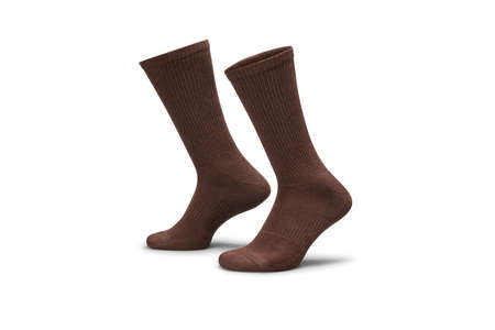 Pair of brown cotton socks isolated on white. Set of short socks for sports as mock up and label for advertising, logo, branding.の写真素材