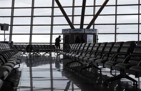 Moscow, Russia, 26-01-2020. Waiting room, Vnukovo airport. A man next to Danon products vending...