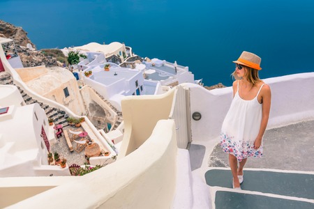 Attractive girl walking on Santoriniの写真素材