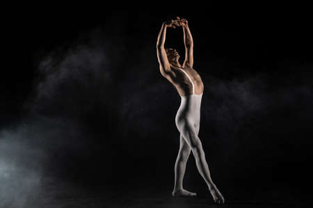 Ballet dancer on a black background
