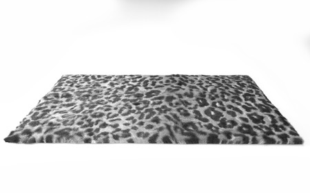 Fuzzy carpet isolated on white background. Interior element. 3d render