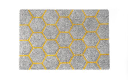 Furry carpet with honeycomb texture, isolated on white background. Interior element. 3d render