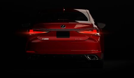 Almaty, Kazakhstan - February 26, 2019: The 2019 Lexus ES 350 F SPORT on black background. Luxury sedan in dark studio light. 3d renderのeditorial素材