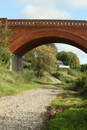 Beautiful natural view under the old bridge, Kuldiga, Latvia. High quality photo