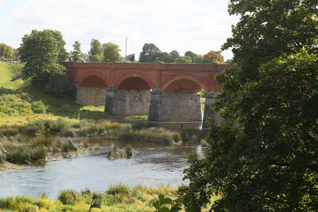 Old bridge on the Venta River, Kuldiga, Latvia. High quality photoの写真素材