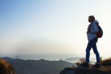 Mountains with heavy backpack Travel Lifestyle wanderlust adventure concept vacations