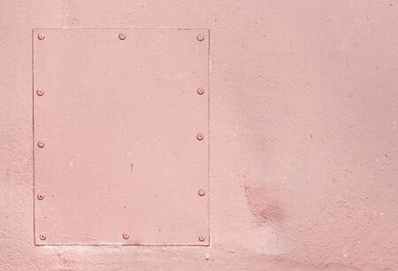 Red colored and weathered metal board