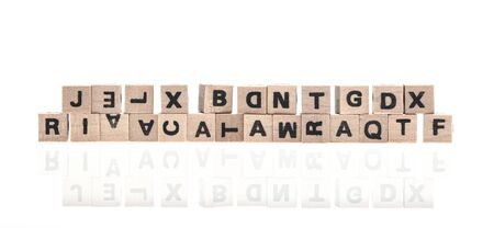 Wooden letters on white background