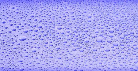 Water drops on blue transparent backgroundの写真素材