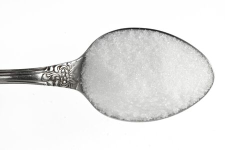 Teaspoon with sugar isolated on white backgroundの写真素材
