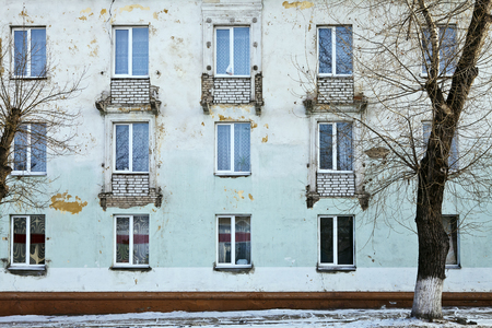Wall of the old high-rise building during the renovationの写真素材