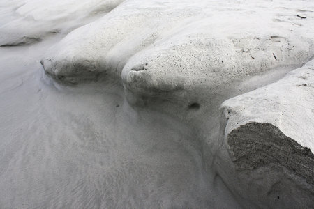 white rock on the beach in winter, north china, closeup of photo