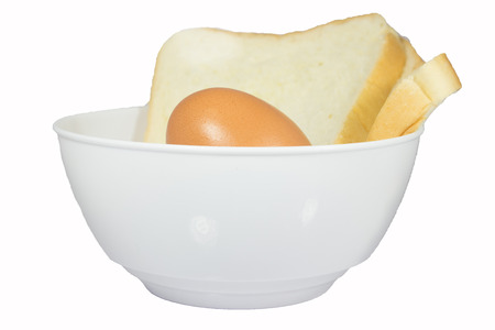 With bread and egg in a cup の写真素材