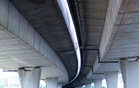 Under the bridge across the river